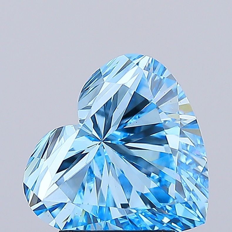 Loose Diamond - HEART 3.01ct Fancy Vivid Blue VS2: Loose Diamond - HEART 3.01ct Fancy Vivid Blue VS2 Source: This is a real non-mined Diamond that has been grown in a lab Shape: HEART Carats: 3.01 Color: Fancy Vivid Blue Certification: IGI Video: