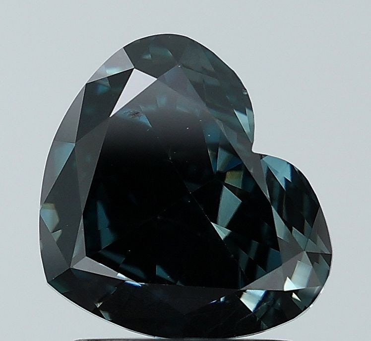 Loose Diamond - HEART 1.89ct Fancy Vivid Blue VS1: Loose Diamond - HEART 1.89ct Fancy Vivid Blue VS1 Source: This is a real non-mined Diamond that has been grown in a lab Shape: HEART Carats: 1.89 Color: Fancy Vivid Blue Certification: NONE Video: