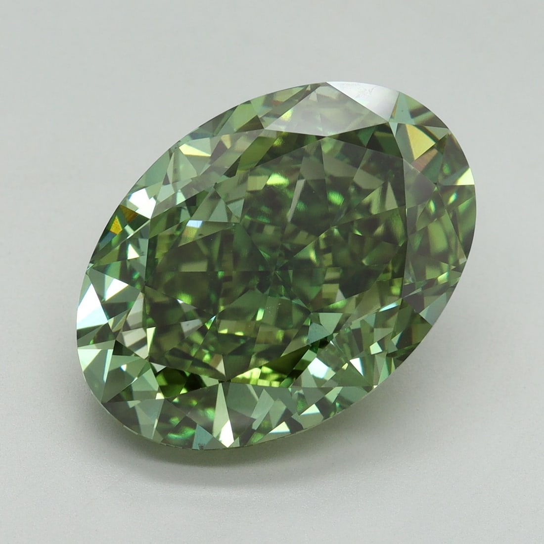 Loose Diamond - OVAL 11.06ct Fancy Vivid Green VS1: Loose Diamond - OVAL 11.06ct Fancy Vivid Green VS1 Source: This is a real non-mined Diamond that has been grown in a lab Shape: OVAL Carats: 11.06 Color: Fancy Vivid Green Certification: IGI Video: