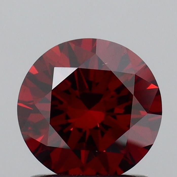 Loose Diamond - ROUND 1.08ct Fancy Deep Orange SI1: Loose Diamond - ROUND 1.08ct Fancy Deep Orange SI1 Source: This is a real non-mined Diamond that has been grown in a lab Shape: ROUND Carats: 1.08 Color: Fancy Deep Orange Certification: IGI Video: