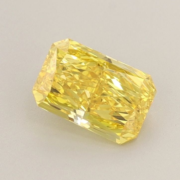 Loose Diamond - RADIANT 0.85ct Fancy Vivid Yellow VS1: Loose Diamond - RADIANT 0.85ct Fancy Vivid Yellow VS1 Source: This is a real non-mined Diamond that has been grown in a lab Shape: RADIANT Carats: 0.85 Color: Fancy Vivid Yellow Certification: IGI Vid