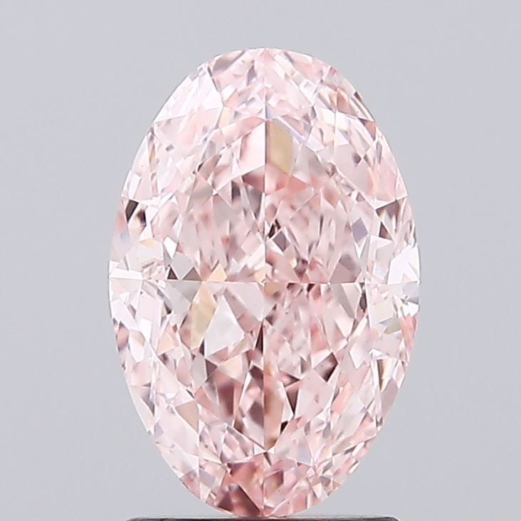 Loose Diamond - OVAL 2.12ct Fancy Vivid Pink VVS2: Loose Diamond - OVAL 2.12ct Fancy Vivid Pink VVS2 Source: This is a real non-mined Diamond that has been grown in a lab Shape: OVAL Carats: 2.12 Color: Fancy Vivid Pink Certification: IGI Video: