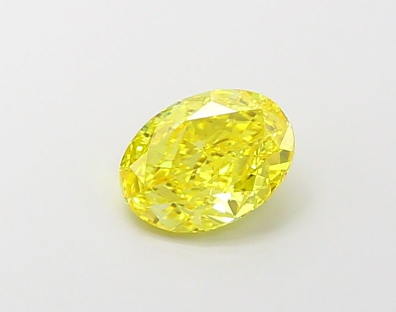Loose Diamond - OVAL 1.02ct Fancy Vivid Yellow VS1: Loose Diamond - OVAL 1.02ct Fancy Vivid Yellow VS1 Source: This is a real non-mined Diamond that has been grown in a lab Shape: OVAL Carats: 1.02 Color: Fancy Vivid Yellow Certification: IGI Video: