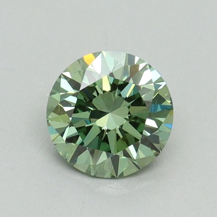 Loose Diamond - ROUND 0.64ct Fancy Vivid Green VS1: Loose Diamond - ROUND 0.64ct Fancy Vivid Green VS1 Source: This is a real non-mined Diamond that has been grown in a lab Shape: ROUND Carats: 0.64 Color: Fancy Vivid Green Certification: IGI Video: