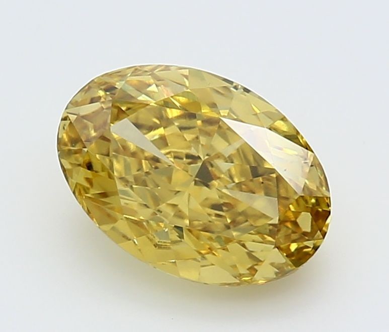 Loose Diamond - OVAL 2.14ct Fancy Vivid Yellow VS2: Loose Diamond - OVAL 2.14ct Fancy Vivid Yellow VS2 Source: This is a real non-mined Diamond that has been grown in a lab Shape: OVAL Carats: 2.14 Color: Fancy Vivid Yellow Certification: IGI Video:
