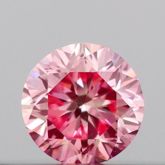 Loose Diamond - ROUND 0.11ct Fancy Vivid Pink VS1: Loose Diamond - ROUND 0.11ct Fancy Vivid Pink VS1 Source: This is a real non-mined Diamond that has been grown in a lab Shape: ROUND Carats: 0.11 Color: Fancy Vivid Pink Certification: IGI Video: