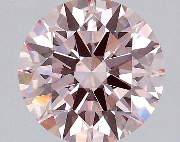 Ideal Loose Diamond - ROUND 1.03ct Fancy Pink VS1: Ideal Loose Diamond - ROUND 1.03ct Fancy Pink VS1 Source: This is a real non-mined Diamond that has been grown in a lab Shape: ROUND Carats: 1.03 Color: Fancy Pink Certification: IGI Video: