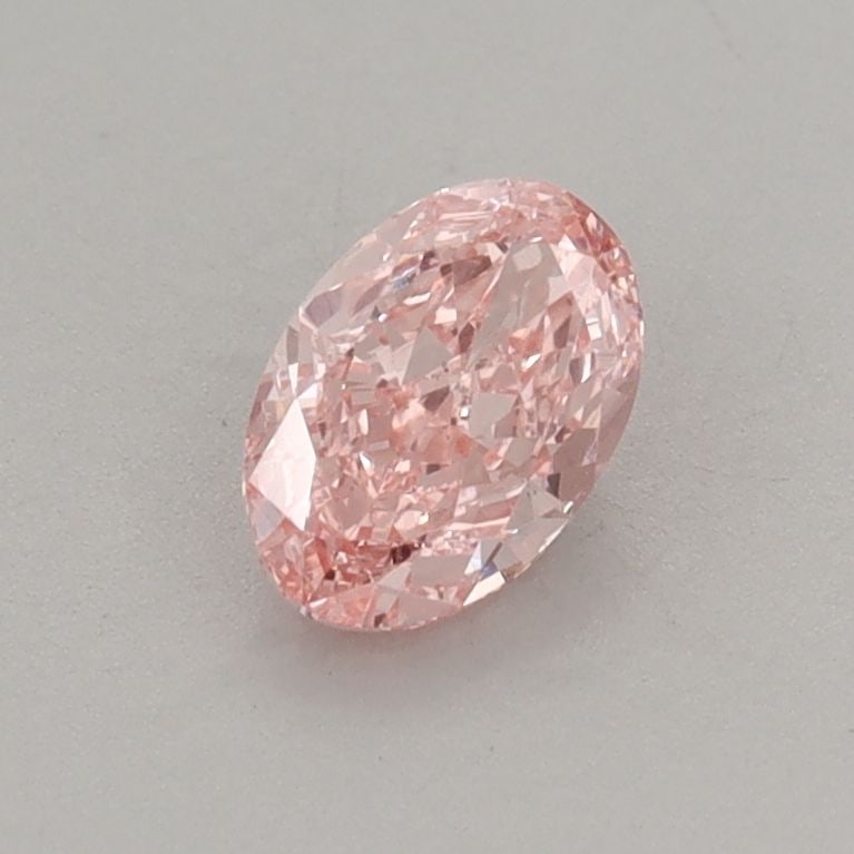 Loose Diamond - OVAL 0.58ct Fancy Vivid Pink VS2: Loose Diamond - OVAL 0.58ct Fancy Vivid Pink VS2 Source: This is a real non-mined Diamond that has been grown in a lab Shape: OVAL Carats: 0.58 Color: Fancy Vivid Pink Certification: IGI Additional im