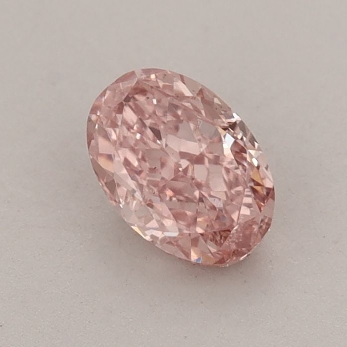 Loose Diamond - OVAL 0.64ct Fancy Vivid Pink VS2: Loose Diamond - OVAL 0.64ct Fancy Vivid Pink VS2 Source: This is a real non-mined Diamond that has been grown in a lab Shape: OVAL Carats: 0.64 Color: Fancy Vivid Pink Certification: IGI Video: