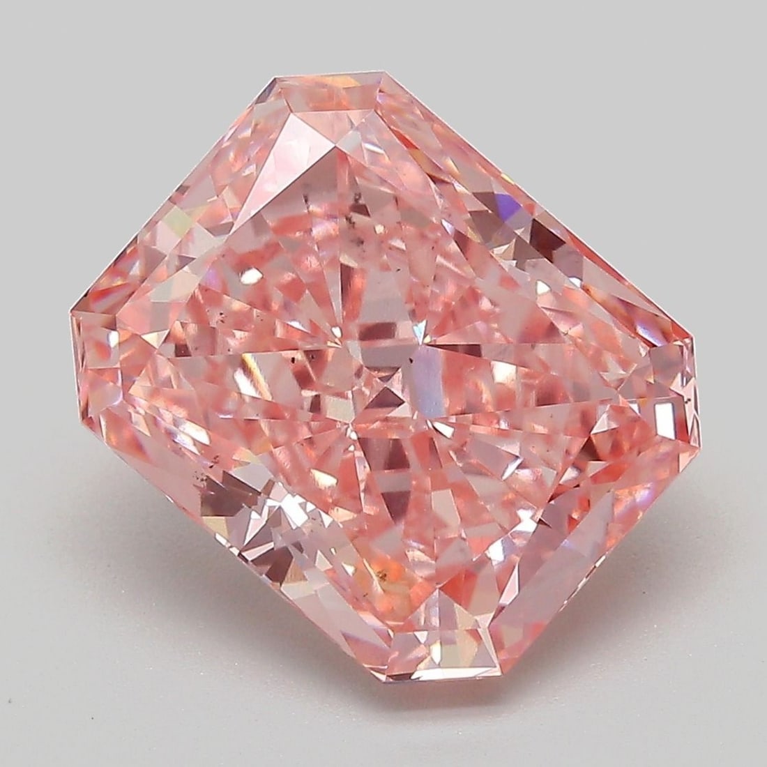 Loose Diamond - RADIANT 6.18ct Fancy Vivid Pink VS2: Loose Diamond - RADIANT 6.18ct Fancy Vivid Pink VS2 Source: This is a real non-mined Diamond that has been grown in a lab Shape: RADIANT Carats: 6.18 Color: Fancy Vivid Pink Certification: IGI Video: