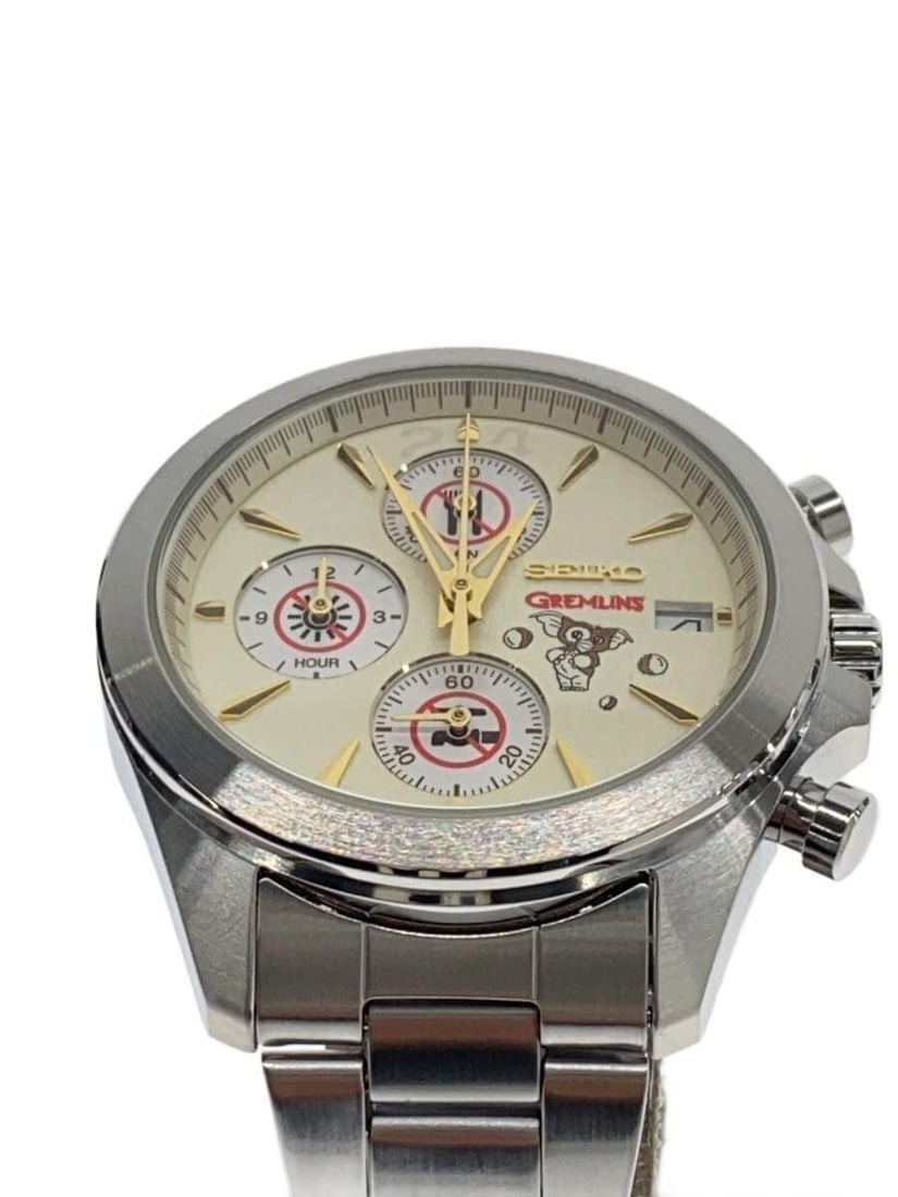 Seiko Gremlins 40th Anniversary Gold Quartz Wristwatch: Seiko Gremlins 40th Anniversary Gold Quartz Wristwatch This SEIKO Gremlins 40th Anniversary men's wristwatch features a quartz movement and a gold-tone stainless steel case and band. Made in Japan, it