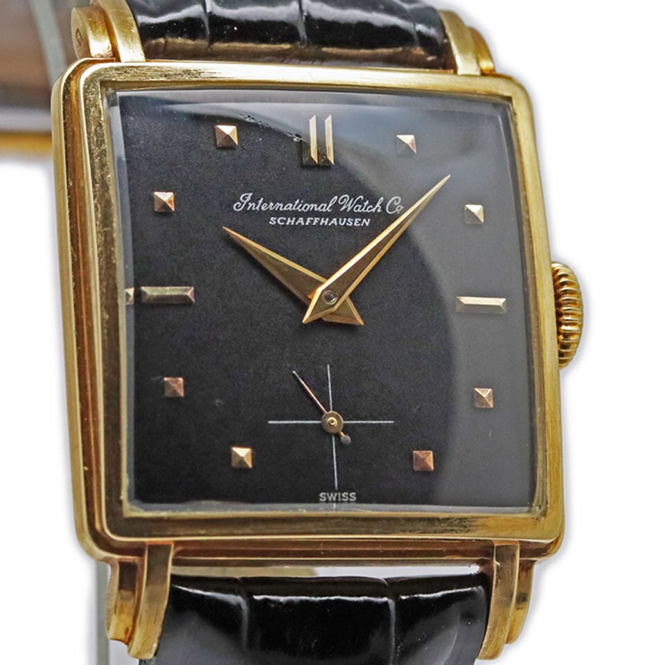 IWC Vintage Square 18K Gold Hand-Wound Watch Cal.62 Redone Dial: IWC Vintage Square 18K Gold Hand-Wound Watch Cal.62 Redone Dial This exquisite IWC Vintage Square watch showcases a unique blend of elegance and history, crafted around 1946. The watch features a stri