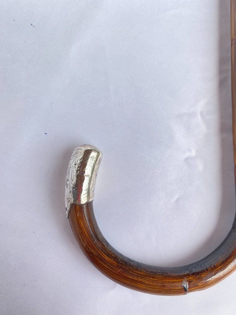 19th Century English Sterling Silver Bamboo Walking Cane Signed 36.50": 19th Century English Sterling Silver Bamboo Walking Cane Signed 36.50" This exquisite 19th century English walking cane showcases a stunning blend of sterling silver and bamboo wood. Crafted between 1