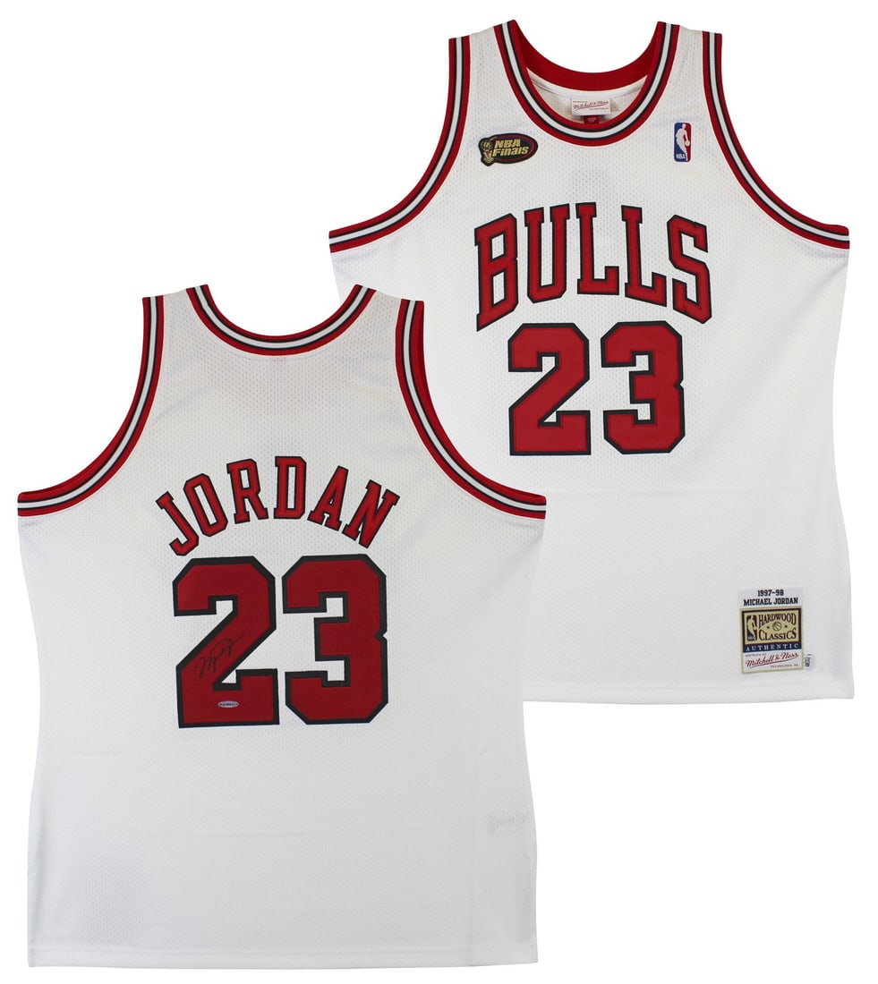 Michael Jordan UDA Signed 1997-98 Mitchell Ness White Bulls Authentic Jersey: Michael Jordan UDA Signed 1997-98 Mitchell Ness White Bulls Authentic Jersey This 1997-98 Mitchell & Ness Hardwood Classics authentic Chicago Bulls jersey is personally signed by Michael Jordan. The w