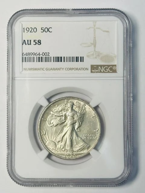 1920 Silver Walking Liberty Half Dollar NGC AU 58: 1920 Silver Walking Liberty Half Dollar NGC AU 58 This 1920 Walking Liberty Half Dollar is certified by NGC with a grade of AU 58, indicating it is in About Uncirculated condition. Composed of silver,