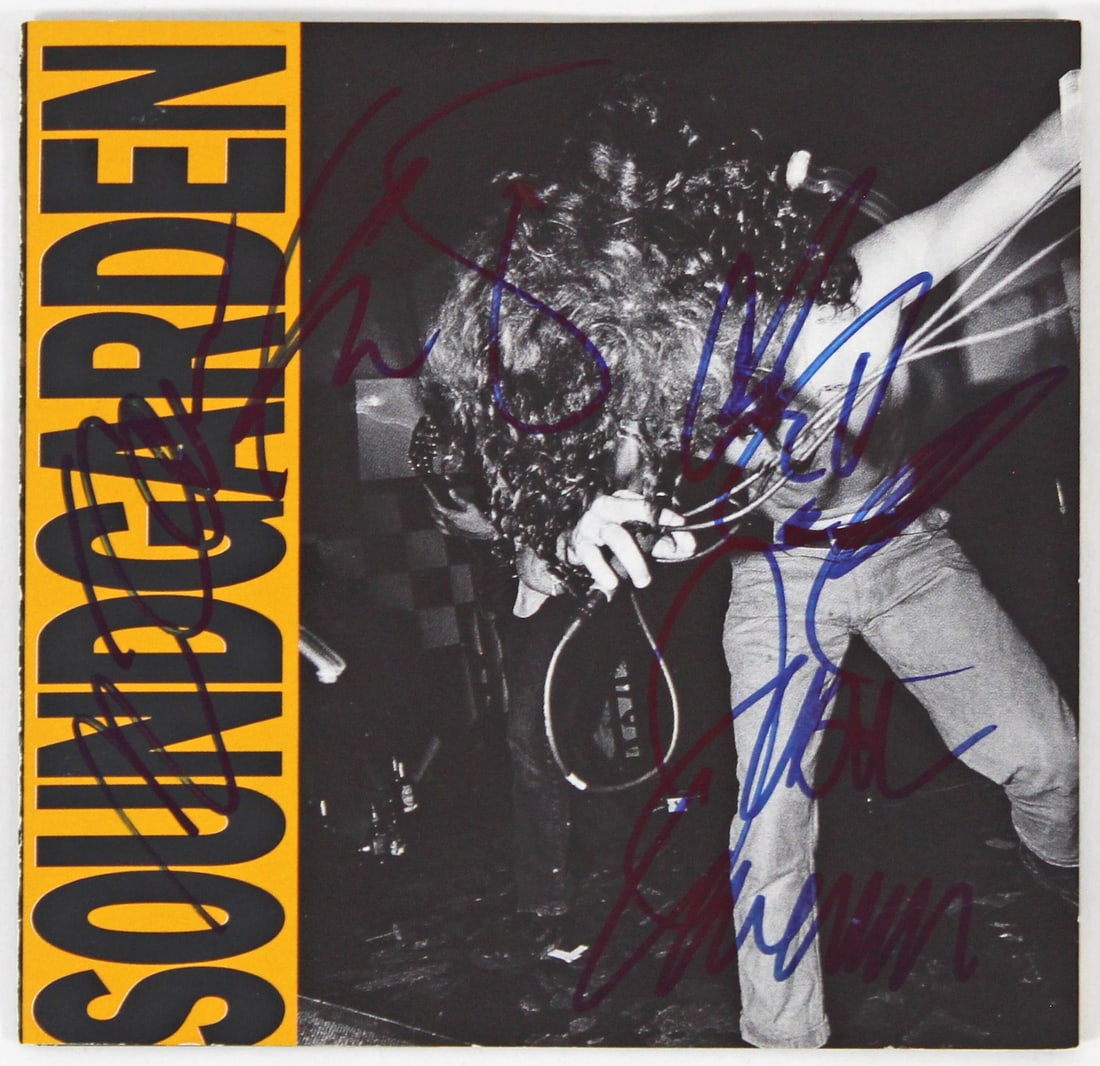 Soundgarden Signed Louder Than Love CD Insert with Disk BAS Authentication: Soundgarden Signed Louder Than Love CD Insert with Disk BAS Authentication This is an original autographed promotional CD insert of 'Louder Than Love' by the iconic rock band Soundgarden. The insert h
