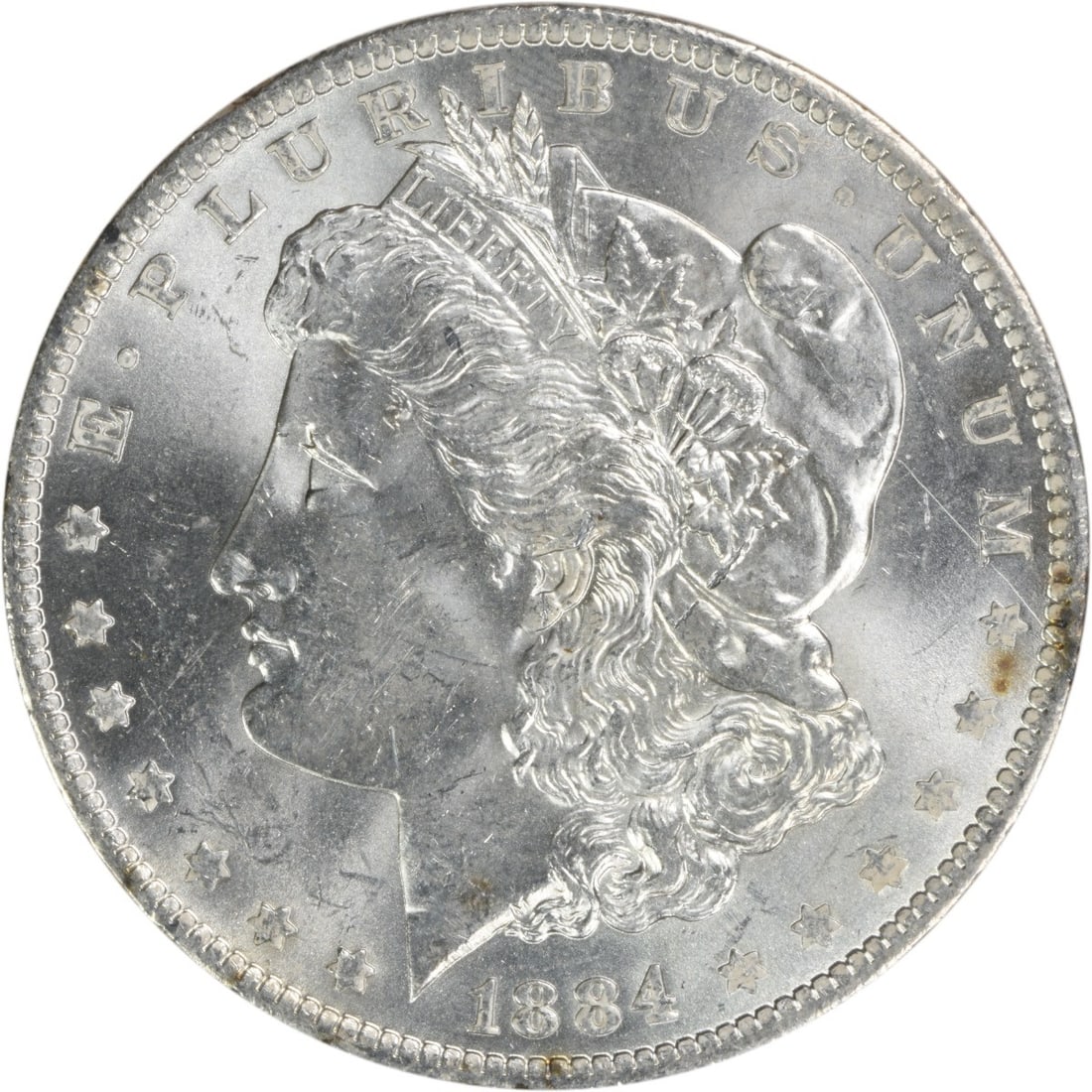 Choice BU 1884-O Silver Morgan Dollar Uncirculated Uncertified US Coin: Choice BU 1884-O Silver Morgan Dollar Uncirculated Uncertified US Coin This is an 1884-O Morgan Silver Dollar in Choice Brilliant Uncirculated condition. The coin is composed of silver and was minted 