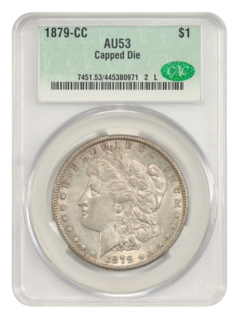 CACG AU53 1879 CC Morgan Dollar Capped Die: CACG AU53 1879 CC Morgan Dollar Capped Die This is an 1879-CC Morgan Dollar featuring the rare Capped Die variety, recognized by the raised dimples or crustiness at the top of the CC mintmark. Certifi