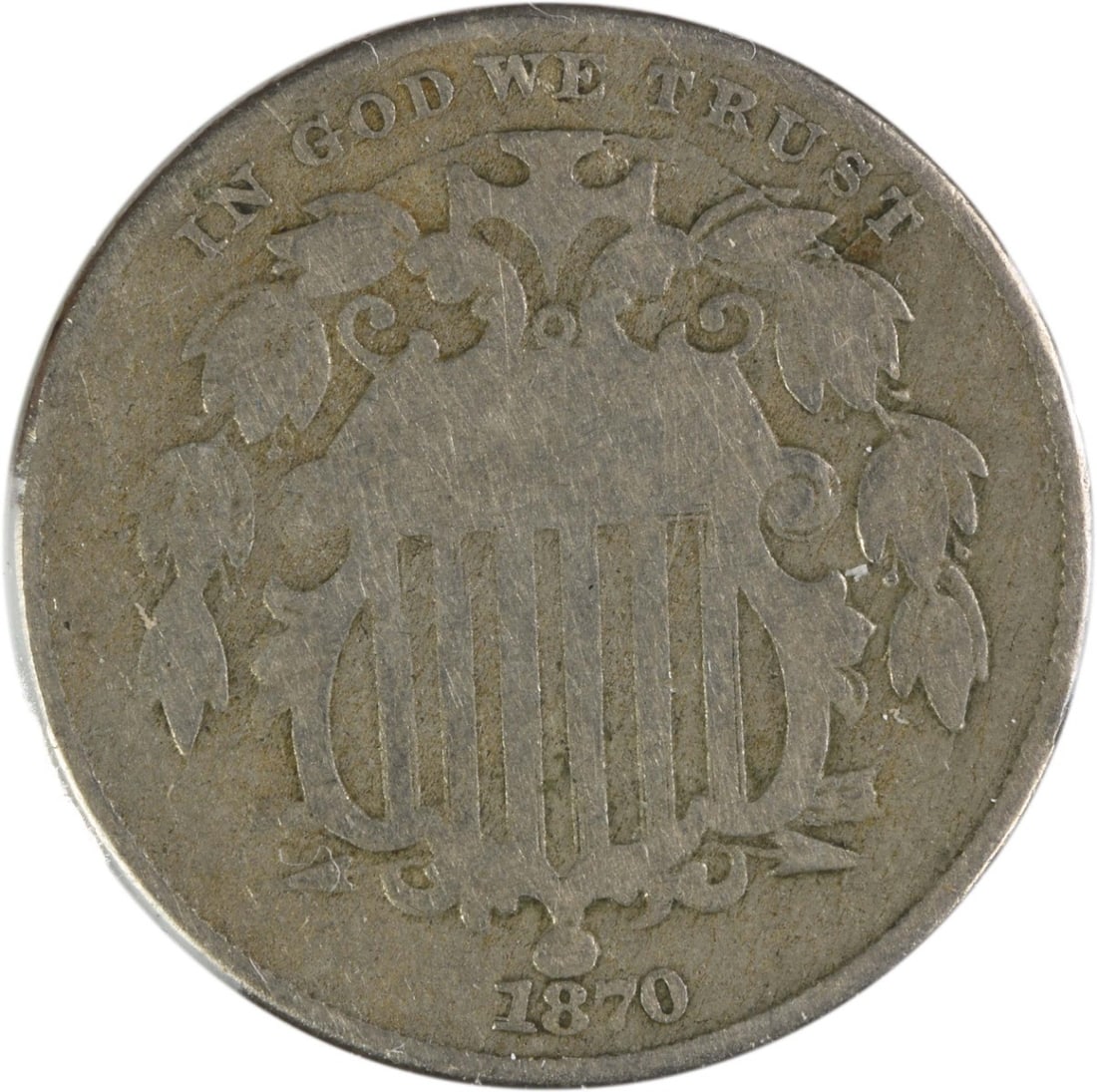 United States 1870/0 Shield Nickel Five Cent VG RPD Uncertified Coin: United States 1870/0 Shield Nickel Five Cent VG RPD Uncertified Coin This is an 1870/0 Shield Nickel, featuring an overdate variety. The coin is circulated and graded VG (Very Good), with a compositio