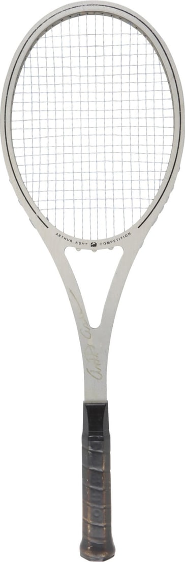 Arthur Ashe RARE Twice-Signed Game Used Tennis Racket with PSA COA: Arthur Ashe RARE Twice-Signed Game Used Tennis Racket with PSA COA This vintage AMF Head "Arthur Ashe Competition" tennis racket is a unique collectible, having been used and signed twice by the legen