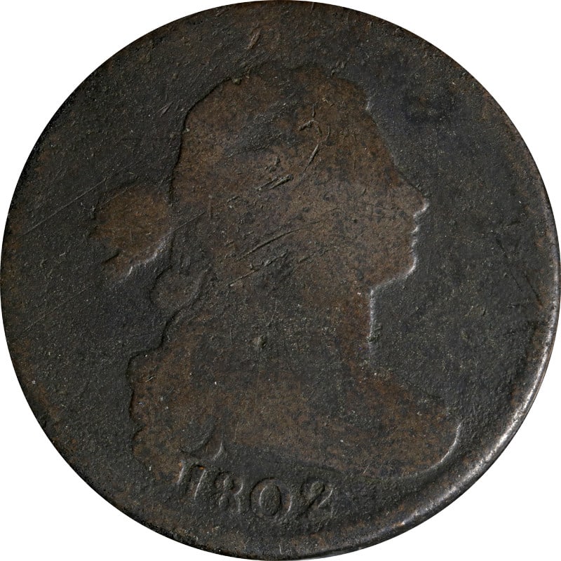 1802 United States Copper Large Cent: 1802 United States Copper Large Cent This 1802 Large Cent is a circulated copper coin from the United States. It is uncertified and offered in pre-owned condition, making it a collectible piece of ear