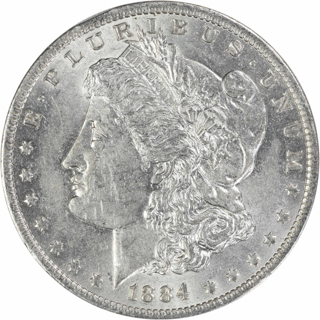 1884 O Morgan Dollar AU Uncertified Silver Coin: 1884 O Morgan Dollar AU Uncertified Silver Coin This 1884-O Morgan Silver Dollar is an attractive example of the classic coin designed by George T. Morgan. Struck in 90% silver and 10% copper, this ci