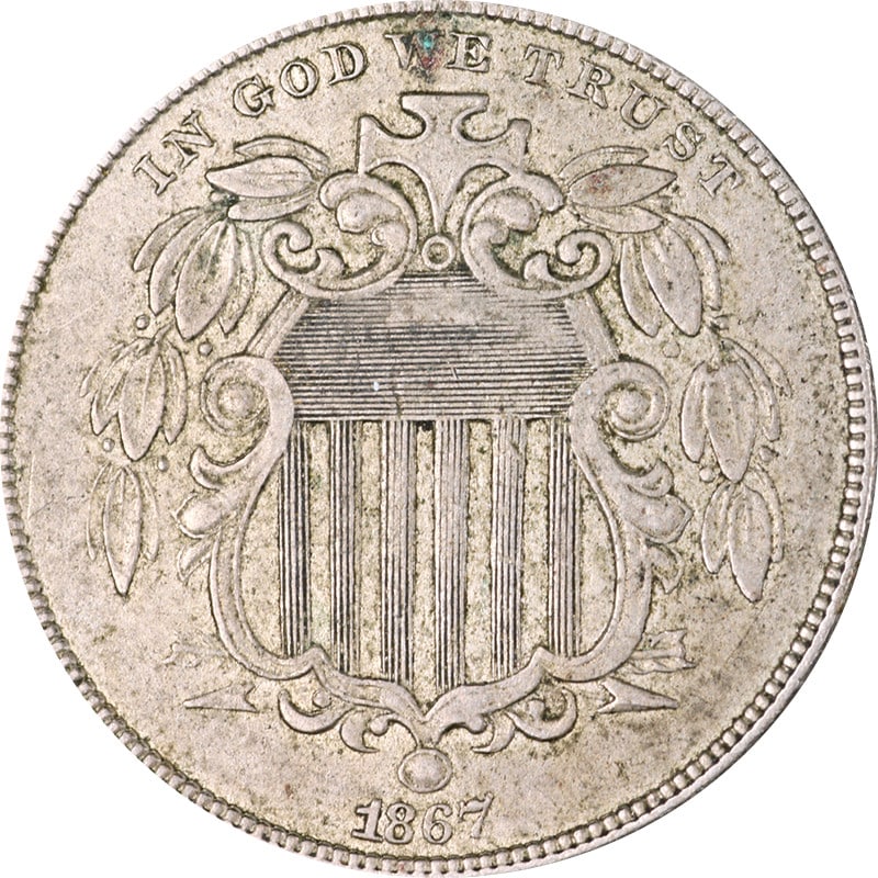 United States 1867 Shield Nickel Circulated Vintage Coin: United States 1867 Shield Nickel Circulated Vintage Coin This is a circulated 1867 Shield Nickel from the United States. Made of nickel composition, this coin is uncertified and is in pre-owned condit