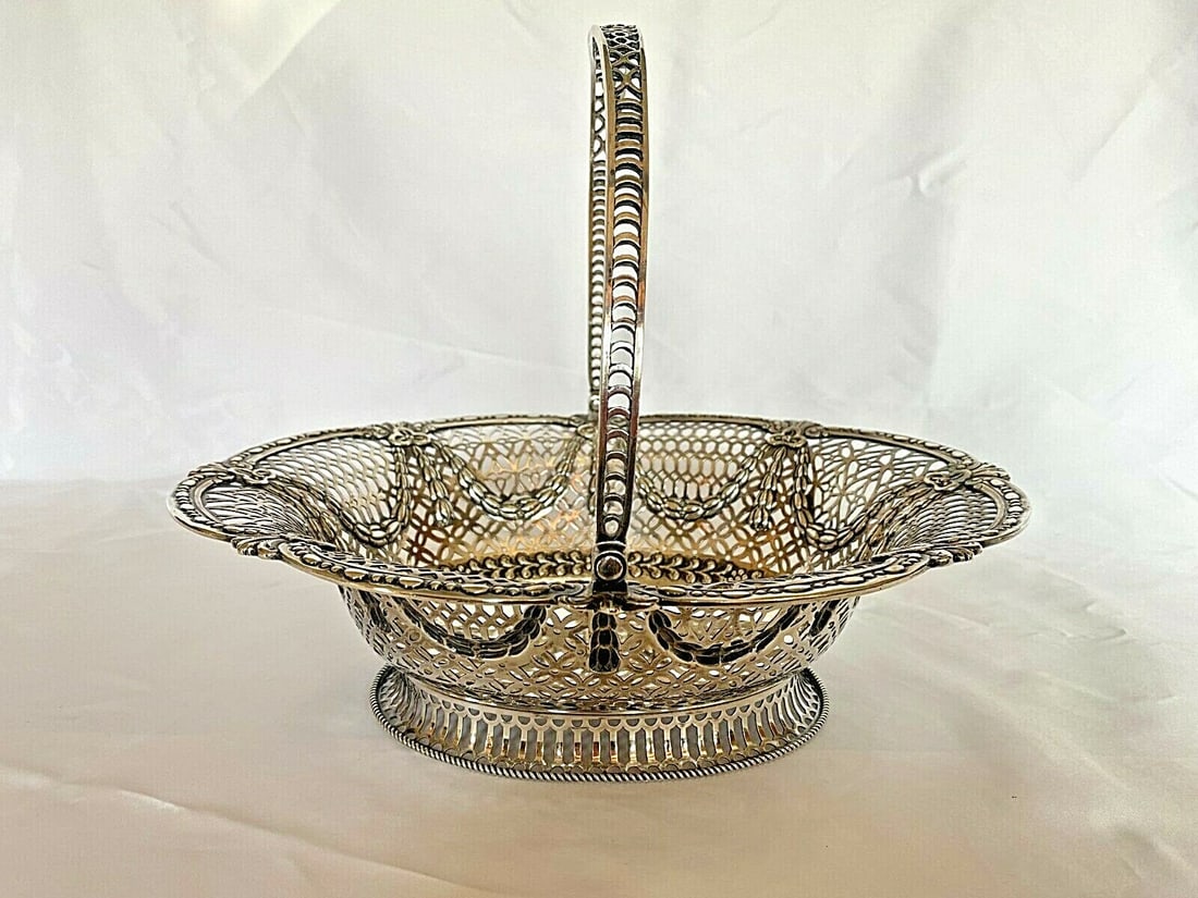 1916 English Sterling Silver Basket by Crichton Bros with Handle: 1916 English Sterling Silver Basket by Crichton Bros with Handle This exquisite English sterling silver basket, crafted by Lionel Alfred Crichton Brothers in London in 1916, showcases a stunning Georg