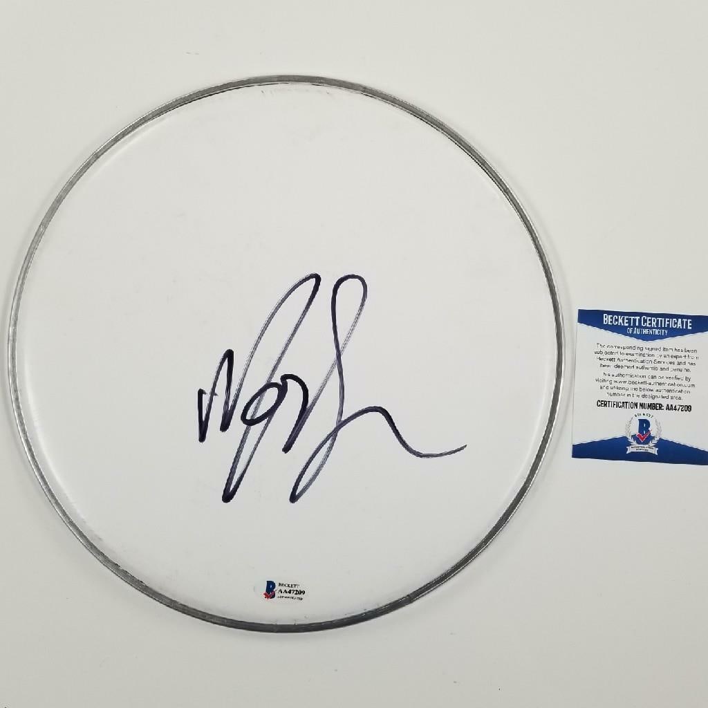 10 Inch Drumhead Signed by Mod Sun with Flames and Beckett COA: 10 Inch Drumhead Signed by Mod Sun with Flames and Beckett COA This original 10-inch drumhead is signed by Mod Sun, the renowned singer and rapper. The autograph is authenticated by Beckett and the it