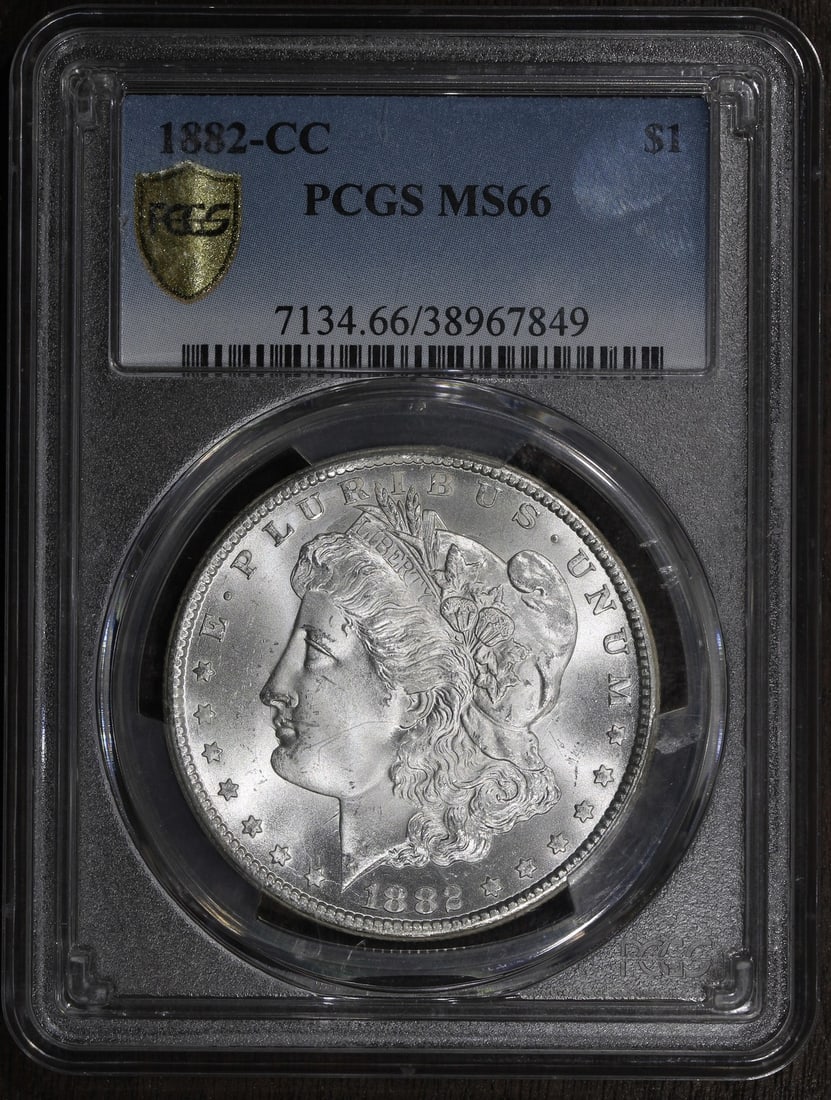 PCGS MS66 1882-CC Morgan Silver Dollar Carson City: PCGS MS66 1882-CC Morgan Silver Dollar Carson City This 1882 Morgan Silver Dollar was minted in Carson City and is graded MS66 by the Professional Coin Grading Service (PCGS). Made from 0.9 fine silve