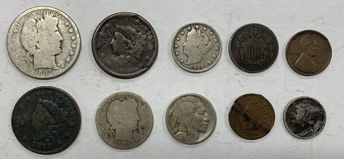 Lot of 10 US Type Coins Damaged 1907-O Barber Half Dollar Included: Lot of 10 US Type Coins Damaged 1907-O Barber Half Dollar Included This is a lot of 10 circulated US type coins, featuring various denominations from cents to half dollars. The collection includes pie