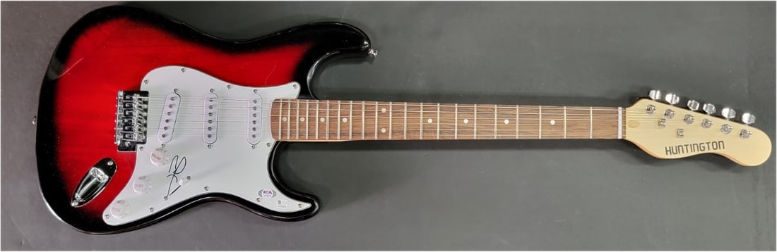 Brad Pitt Autographed Electric Guitar PSA/DNA Authentic Signature: Brad Pitt Autographed Electric Guitar PSA/DNA Authentic Signature This is an authentic electric guitar autographed by the iconic movie star Brad Pitt. The signature has been authenticated by Professio
