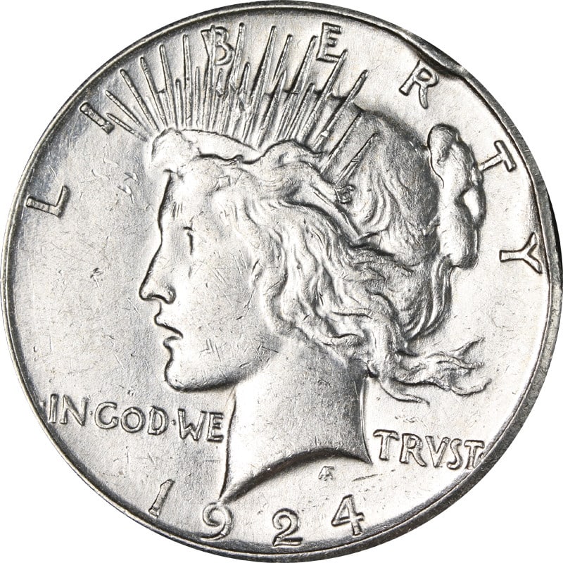 1924-S Silver Peace Dollar Rim Bumps: 1924-S Silver Peace Dollar Rim Bumps This 1924-S Peace Dollar is a circulated silver coin from the United States, featuring rim bumps. It has a silver fineness of 0.9 and was minted in 1924 at the San