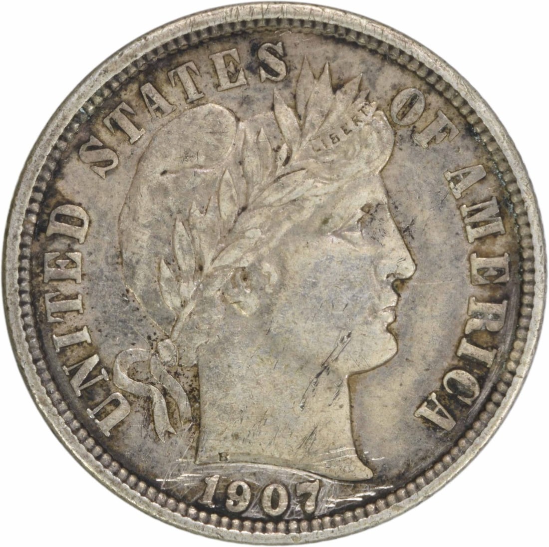 1907 Barber Dime AU 90% Silver Uncertified Philadelphia Mint: 1907 Barber Dime AU 90% Silver Uncertified Philadelphia Mint This 1907 Barber Silver Dime is a remarkable piece of numismatic history. Struck at the Philadelphia Mint, this coin features the classic B