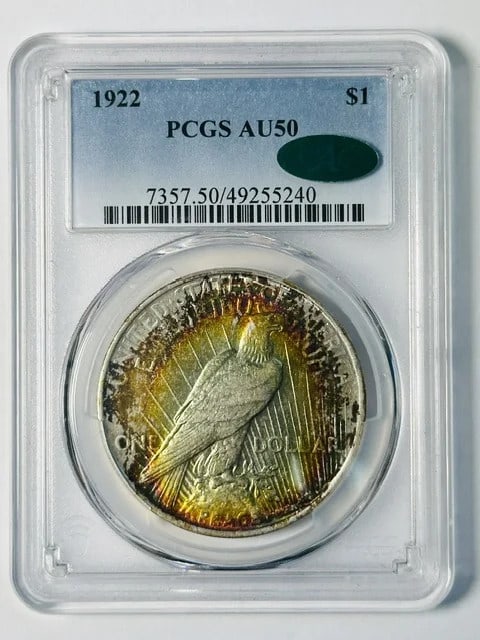 1922 Philadelphia Peace Dollar PCGS CAC AU-50 Rainbow Toning: 1922 Philadelphia Peace Dollar PCGS CAC AU-50 Rainbow Toning This 1922 Peace Dollar features impressive rainbow toning and has been graded AU-50 by PCGS. It is also certified by CAC, ensuring its qual