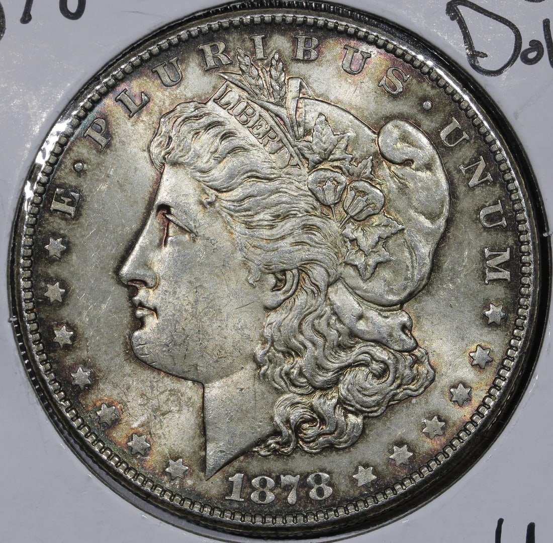 San Francisco 1878-S Morgan Silver Dollar Nice Toning BU: San Francisco 1878-S Morgan Silver Dollar Nice Toning BU This 1878-S Morgan Silver Dollar is an uncirculated coin featuring attractive toning. It is composed of 90% silver and was minted in San Franci
