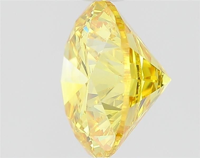 Ideal Loose Diamond - ROUND 1.23ct Fancy Vivid Yellow VVS2: Ideal Loose Diamond - ROUND 1.23ct Fancy Vivid Yellow VVS2 Source: This is a real non-mined Diamond that has been grown in a lab Shape: ROUND Carats: 1.23 Color: Fancy Vivid Yellow Certification: IGI 