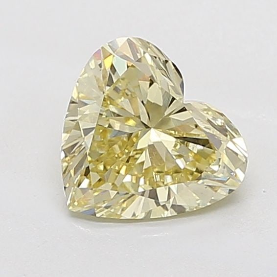 Loose Diamond - HEART 1.69ct Fancy Yellow VS1: Loose Diamond - HEART 1.69ct Fancy Yellow VS1 Source: This is a real non-mined Diamond that has been grown in a lab Shape: HEART Carats: 1.69 Color: Fancy Yellow Certification: IGI Video: