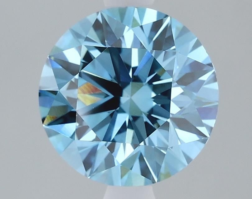 Ideal Loose Diamond - ROUND 2.1ct Fancy Vivid Blue VS1: Ideal Loose Diamond - ROUND 2.1ct Fancy Vivid Blue VS1 Source: This is a real non-mined Diamond that has been grown in a lab Shape: ROUND Carats: 2.1 Color: Fancy Vivid Blue Certification: IGI Video: