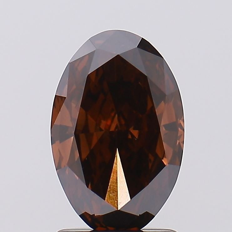 Loose Diamond - OVAL 1.46ct Fancy Deep Brown VS1: Loose Diamond - OVAL 1.46ct Fancy Deep Brown VS1 Source: This is a real non-mined Diamond that has been grown in a lab Shape: OVAL Carats: 1.46 Color: Fancy Deep Brown Certification: IGI Video: