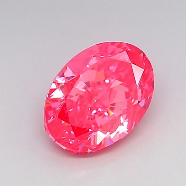 Loose Diamond - OVAL 1.01ct Fancy Vivid Pink VS1: Loose Diamond - OVAL 1.01ct Fancy Vivid Pink VS1 Source: This is a real non-mined Diamond that has been grown in a lab Shape: OVAL Carats: 1.01 Color: Fancy Vivid Pink Certification: IGI Video: