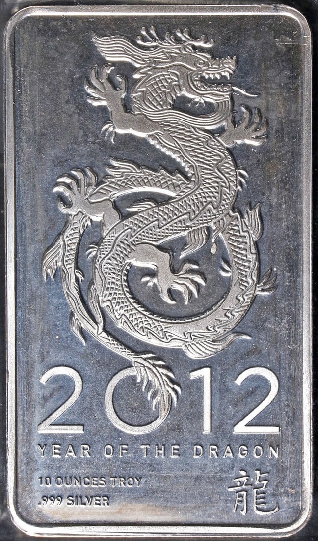 2012 Lunar Dragon 10 Ounce Silver Bar NTR 999 Fine: 2012 Lunar Dragon 10 Ounce Silver Bar NTR 999 Fine This is a 2012 Year of the Dragon Lunar silver bar produced by NTR, composed of .999 fine silver and weighing 10 ounces. The bar was minted in the Un