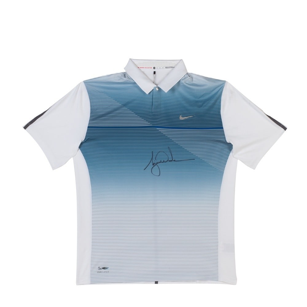 Tiger Woods Autographed Limited Edition Nike Polo Golf Shirt /25 UDA: Tiger Woods Autographed Limited Edition Nike Polo Golf Shirt /25 UDA Own a piece of golf history with this Tiger Woods signed autographed polo golf shirt, featuring a bold white stripe design by Nike.