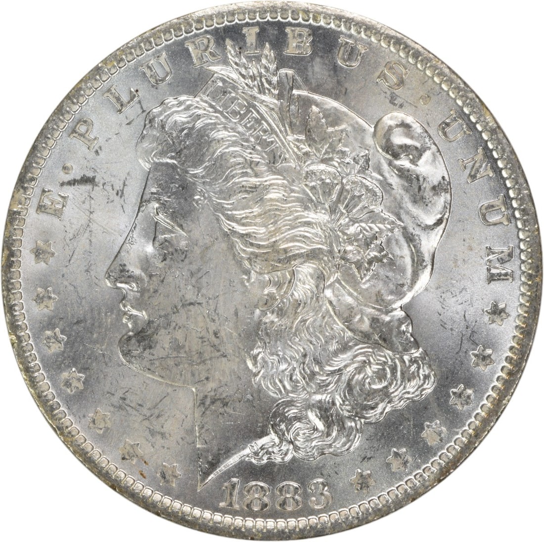 Uncirculated 1883 O Silver Dollar Morgan Brilliant Uncertified US Coin: Uncirculated 1883 O Silver Dollar Morgan Brilliant Uncertified US Coin This is an 1883-O Morgan Silver Dollar from the United States. The coin is composed of silver and has a Brilliant Uncirculated (B