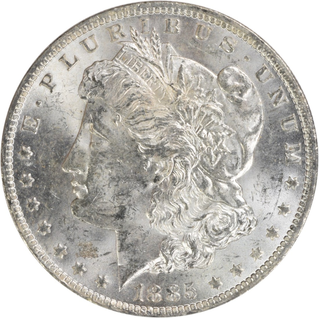 Brilliant Uncirculated 1885-O Silver Morgan Dollar Uncertified US Coin: Brilliant Uncirculated 1885-O Silver Morgan Dollar Uncertified US Coin This 1885-O Morgan Silver Dollar is an uncirculated coin featuring brilliant uncirculated (BU) grade. Struck at the New Orleans M