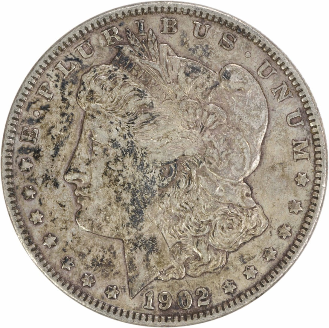 1902 Morgan Silver Dollar EF Uncertified 90% Silver Coin: 1902 Morgan Silver Dollar EF Uncertified 90% Silver Coin This 1902 Morgan Silver Dollar is a remarkable piece of numismatic history. Featuring a composition of 90% silver and 10% copper, this coin was