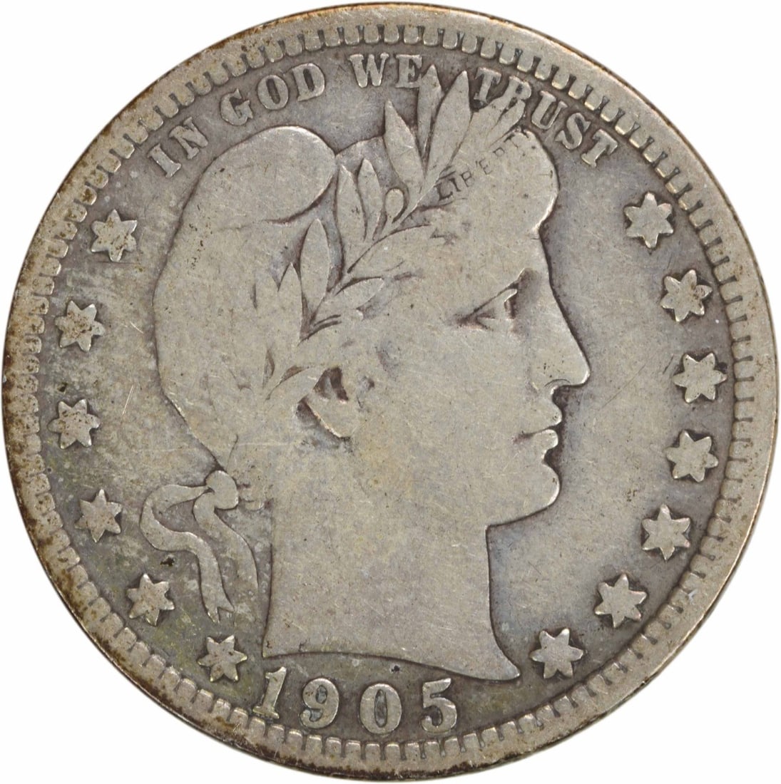 1905 Barber Quarter 25C F Uncertified 90% Silver Coin: 1905 Barber Quarter 25C F Uncertified 90% Silver Coin This 1905 Barber Silver Quarter is a remarkable piece of numismatic history, featuring a design by Charles E. Barber. Struck at the Philadelphia M