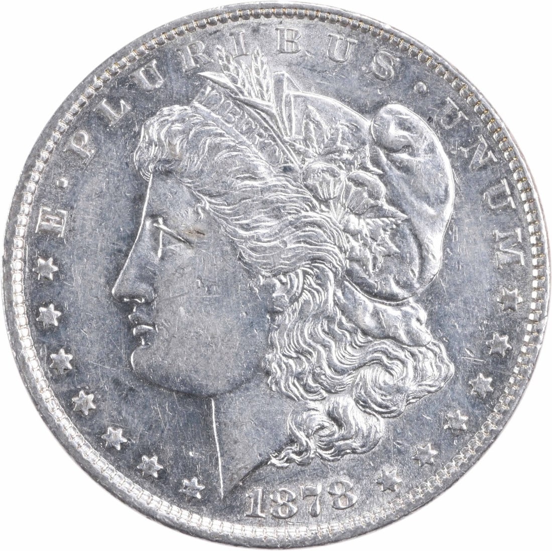 1878 Morgan Silver Dollar AU Uncertified 90% Silver Coin: 1878 Morgan Silver Dollar AU Uncertified 90% Silver Coin This 1878 Morgan Silver Dollar features a classic design by George T. Morgan and is composed of 90% silver and 10% copper. This coin has been c