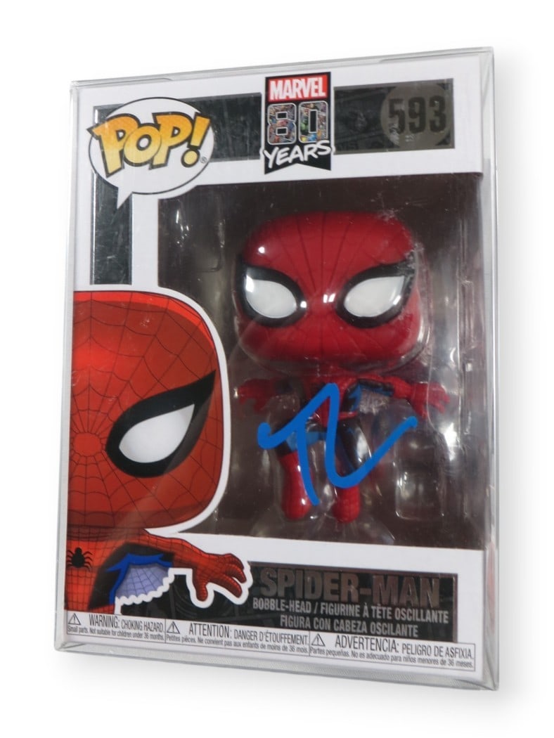 Spider-Man 593 Funko POP Figure Signed Twice by Tobey Maguire Beckett Authenticated: Spider-Man 593 Funko POP Figure Signed Twice by Tobey Maguire Beckett Authenticated This is an original Funko POP! Figure of Spider-Man (number 593) autographed by Tobey Maguire. The figure has been a