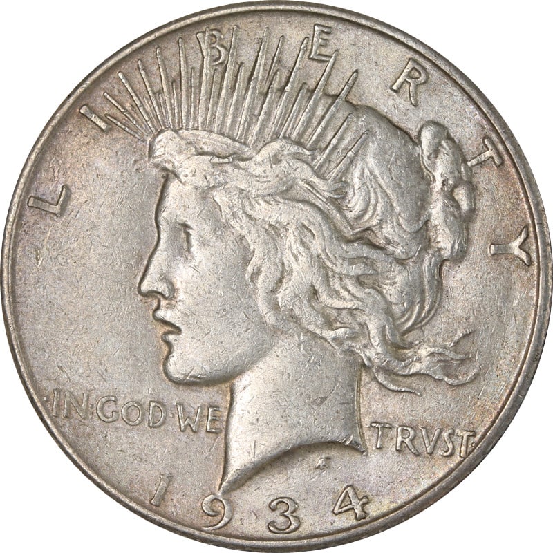 1934-S Silver Peace Dollar UNCERTIFIED: 1934-S Silver Peace Dollar UNCERTIFIED This 1934-S Peace Dollar is a circulated silver coin from the United States, featuring a fineness of 0.9. It is offered in pre-owned condition and is uncertified
